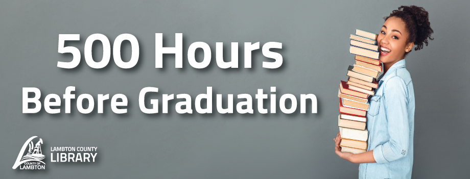 A person is standing against a plain gray background, holding a tall stack of books in both arms. Large white text on the left side reads: “500 Hours Before Graduation.” At the bottom left corner, there is the Lambton County Library logo featuring a stylized book and tower with the words “Lambton County Library.”